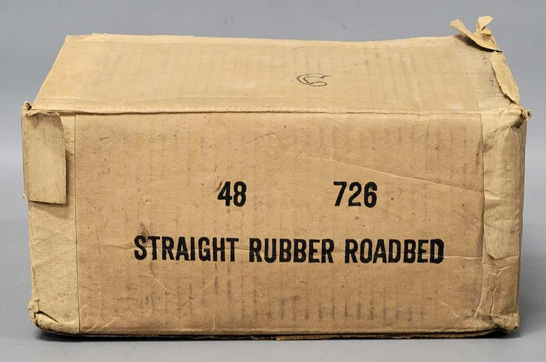 48 mint American Flyer Postwar S gauge 726 black straight rubber roadbed sections in original box: 48 mint American Flyer Postwar S 726 black straight rubber roadbed sections in original box. These appear to have never been removed, the box does have some stains as seen in the photos.