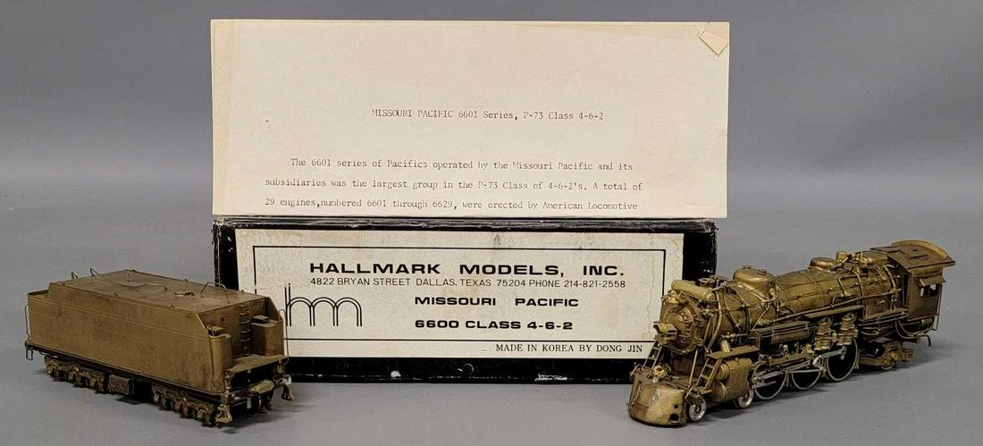 Hallmark Dong Jin HO scale brass Missouri Pacific 6600 class 4-6-2 steam in original box: Hallmark Dong Jin HO scale brass Missouri Pacific 6600 class 4-6-2 steam in original box. A fantastic looking piece, shows light run time if any at all, C8-9 in a good original box with original foam