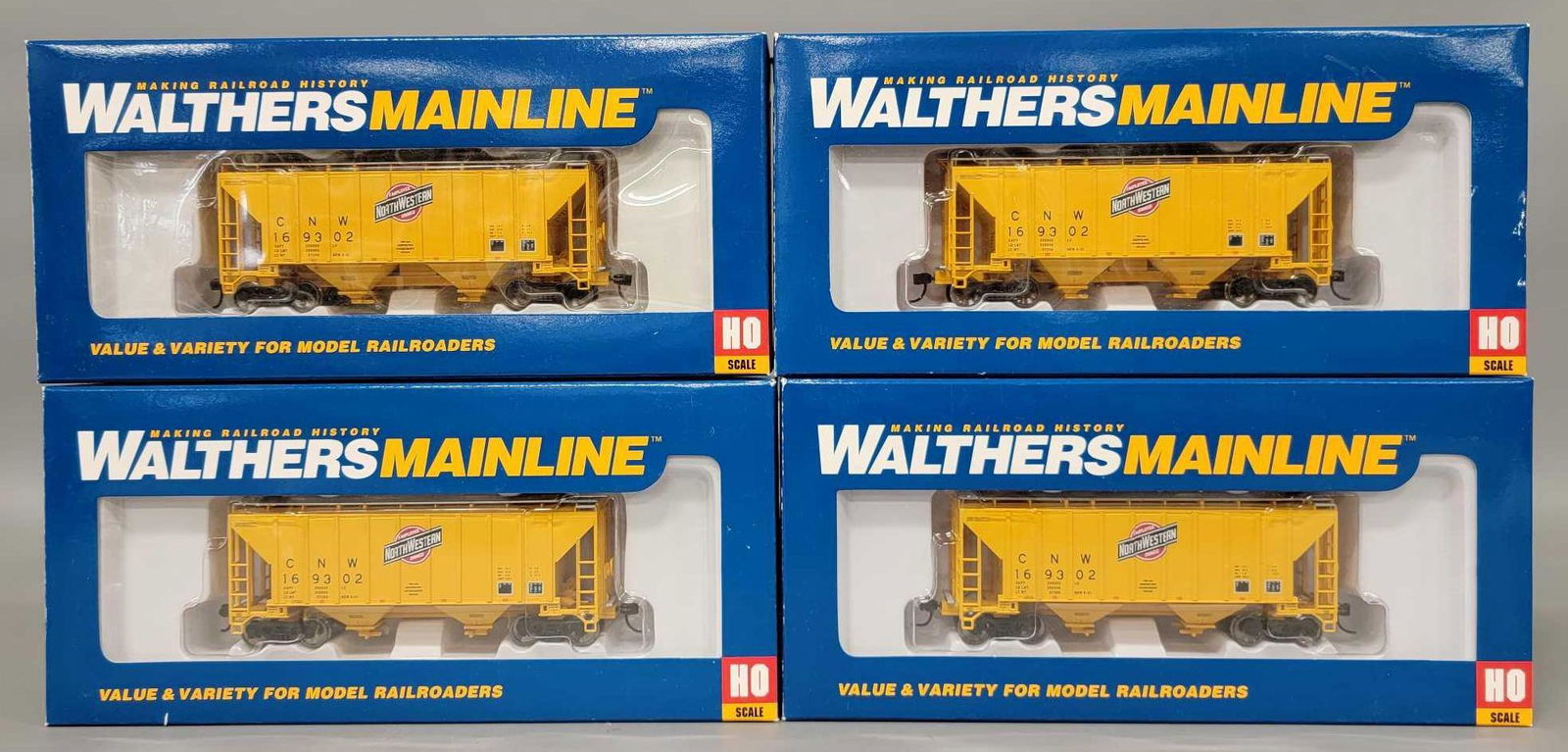 Four Walthers Mainline HO scale Chicago & Northwestern covered hoppers in OBs (1 of 4)