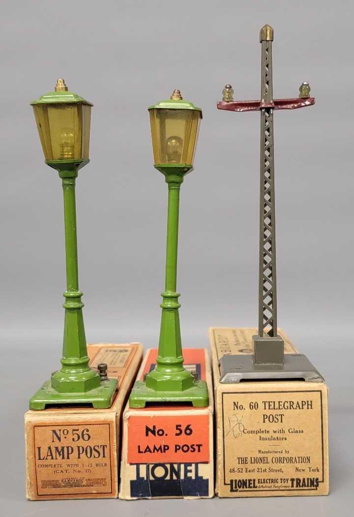 Lionel prewar O gauge 56 lamp posts and 60 telegraph post in original