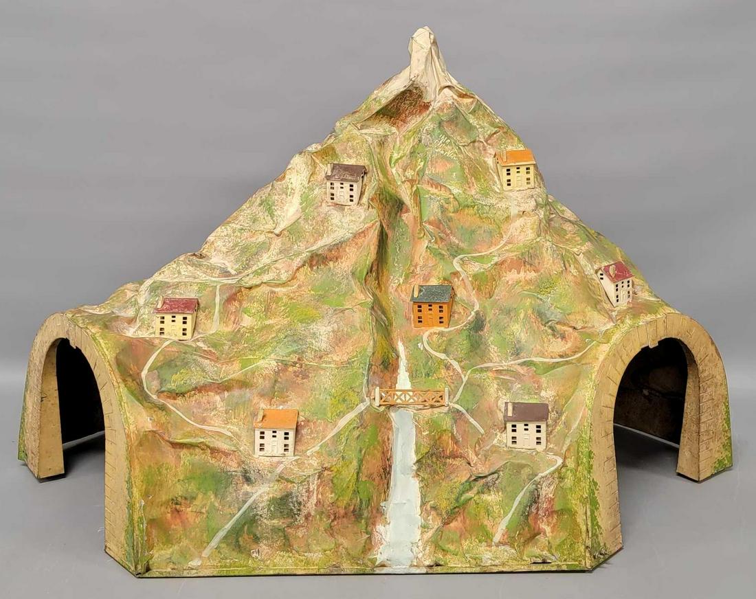 Lionel prewar standard gauge 140L tunnel: Lionel prewar standard gauge 140L tunnel, all original with some small scratches, C6-7. This tunnel is extremely large but very light and would likely cost a lot to ship. We do travel a lot to pick up