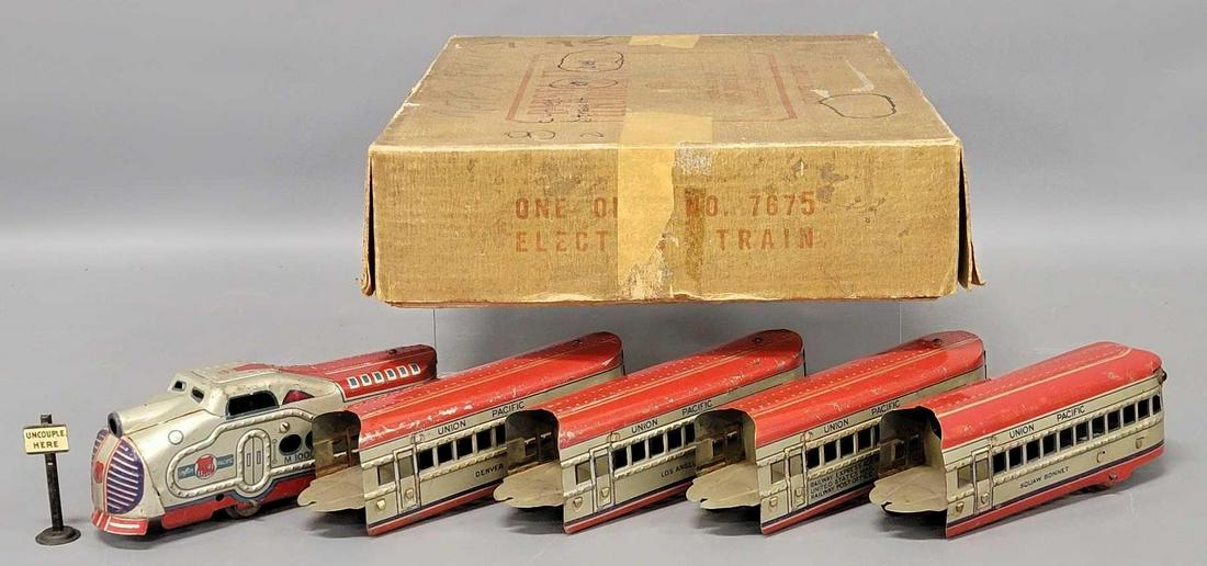 Boxed Marx O gauge 7675 aluminum and red Union Pacific diesel passenger set: Boxed Marx O gauge 7675 aluminum and red Union Pacific diesel passenger set. Set consists of M10005 Union Pacific diesel locomotive, Railway Express Agency US Mail RPO car, Denver and Los Angeles coac