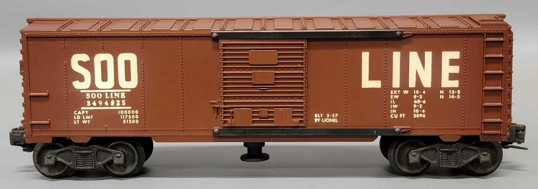 Unrun Lionel postwar O 3494-625 Soo Line operating box car: Unrun Lionel postwar O 3494-625 Soo Line operating box car, car looks C8-9 but the side opposite of where the man is in the door, the SOO have what appears to be touched up paint or possibly where it