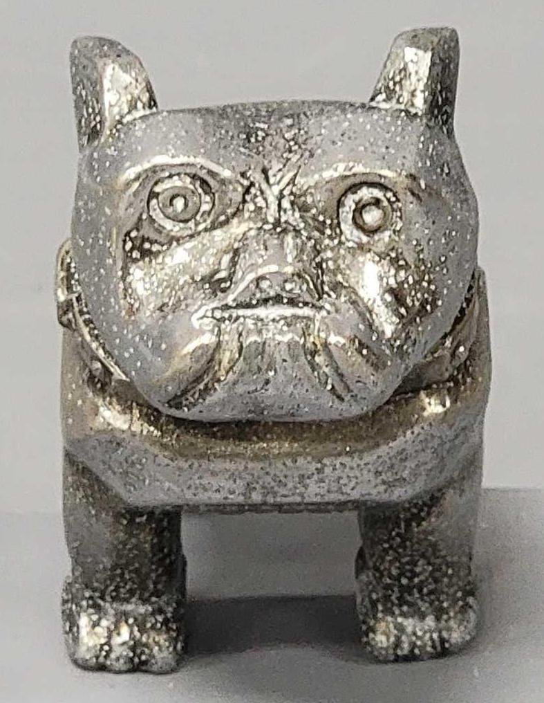 Vintage Mack bulldog hood ornament 87931: Vintage Mack bulldog hood ornament 87932, it is pitted all over and is missing the screws and washers, stands 4 1/4 inches tall when positioned properly NOT including the studs.