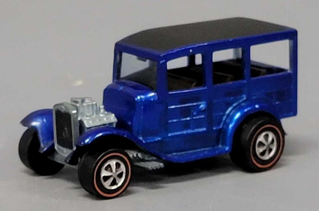 Gorgeous Redline Hot Wheels blue classic 31 Ford Woody: Gorgeous Redline Hot Wheels blue classic 31 Ford Woody, a fantastic car with a couple tiny paint chips on the front of the fender, one on a side rear fender, great wheels and a shiny gunmetal base as
