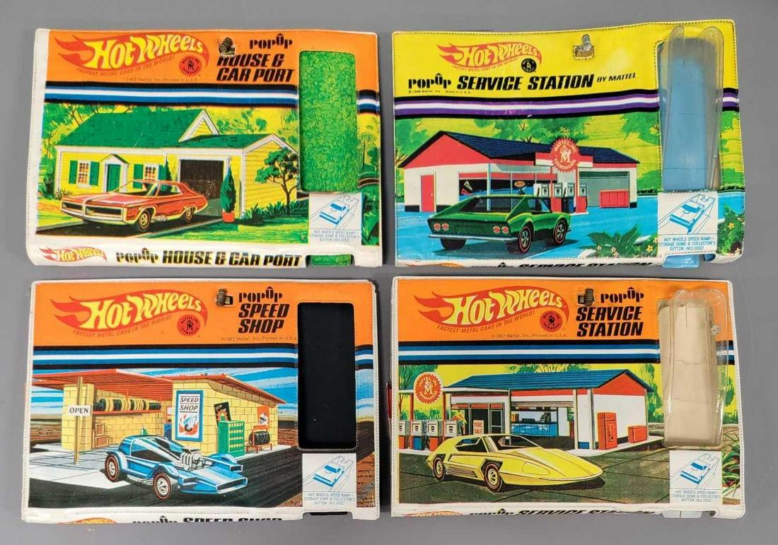 Four Mattel Hot Wheels pop up cases Service Station x 2 Speed Shop and House w/ Carport: Four Mattel Hot Wheels pop up cases to include two different Service Stations with clear ramps (one nice and one disfigured ramp), Speed Shop and House with Carport. These are in nice shape but could