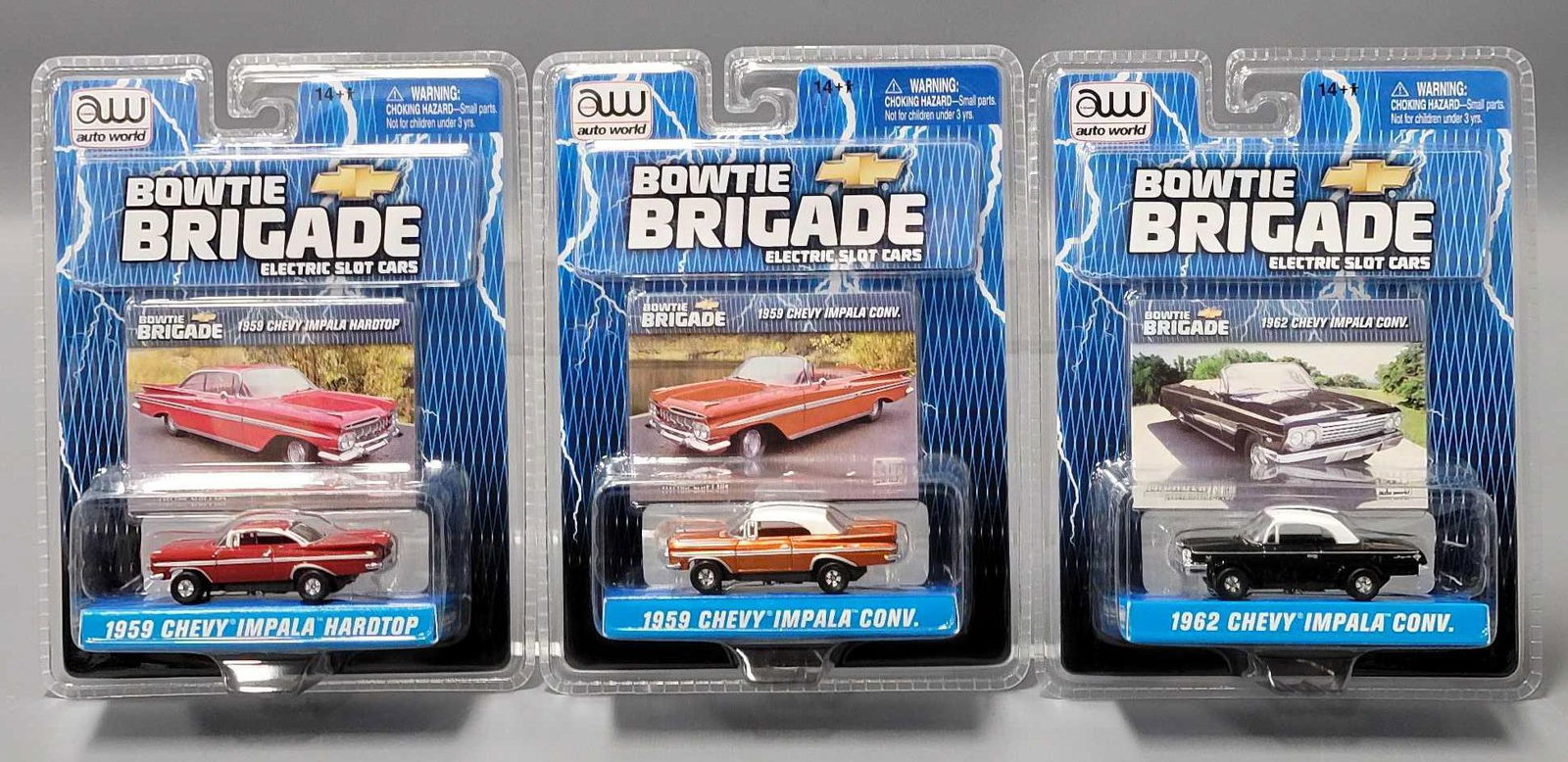 Three Auto World Chevy Impala HO slot cars on sealed blister cards Bowtie Brigade (1 of 5)