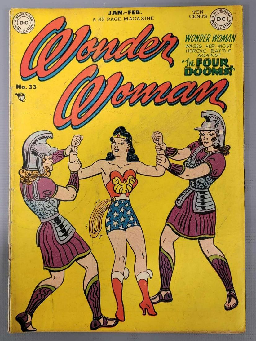 Wonder Woman 33 (DC) 1949: Wonder Woman 33 top left corner chipped, spine tear at staples, still attached as seen in the photos.