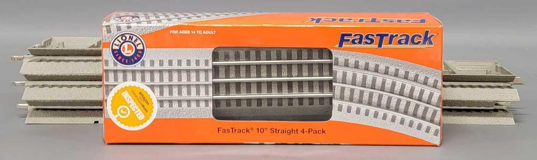 Ten sections of Lionel Fastrack straight 10 inch track: Ten sections of Lionel Fastrack straight 10 inch track, includes four in a box and six loose, all in excellent condition as seen in the photos.
