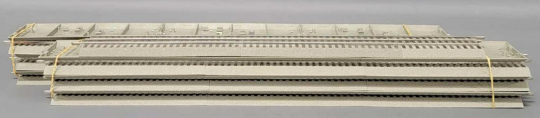 Thirteen sections of Lionel Fastrack straight 25 to 30 inch track: Thirteen sections of Lionel Fastrack straight track to include twelve 30 inch on one 25 inch sections. It is all in excellent condition as seen in the photos.