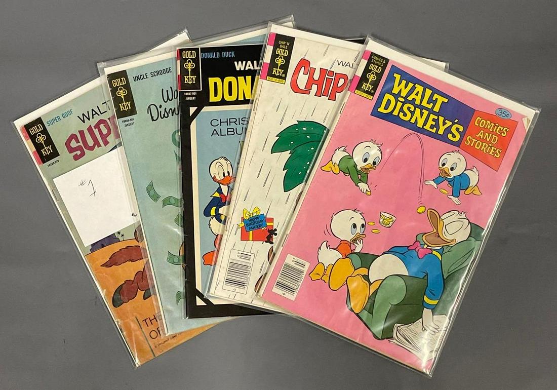 Group of Gold Key Disney comic books: Walt Disney Comics and Stories 454, Chip 'n Dale 54, Donald Duck 99, Uncle Scrooge 40, Super Goof 1 as seen in the photos.