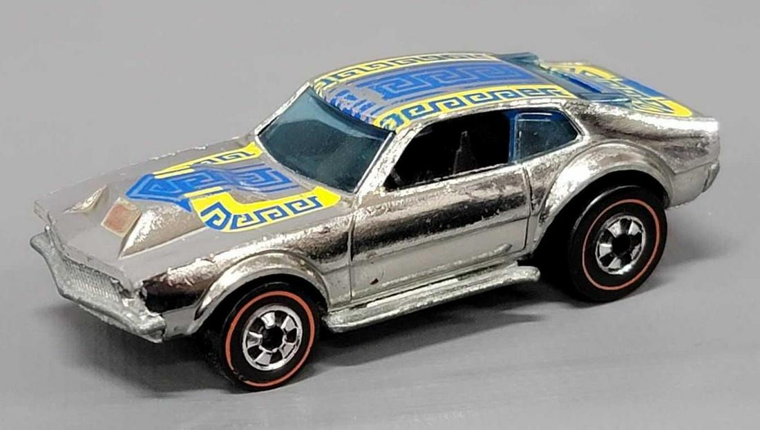 Redline Hot Wheels chrome Mighty Maverick: Redline Hot Wheels chrome Mighty Maverick , nice body with some roof wear, decent wheels and a semi-shiny base as seen in the photos.