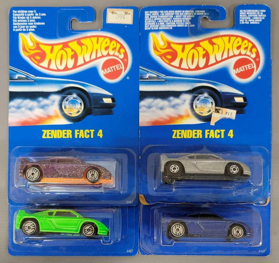 Four Hot Wheels International Cards: Four Hot Wheels International Cards. Zender Fact 4 Silver, Zender Fact 4 Blue, Zender Fact 4 Purple, and Zender Fact 4 Green all mint on blister card and cards are near mint