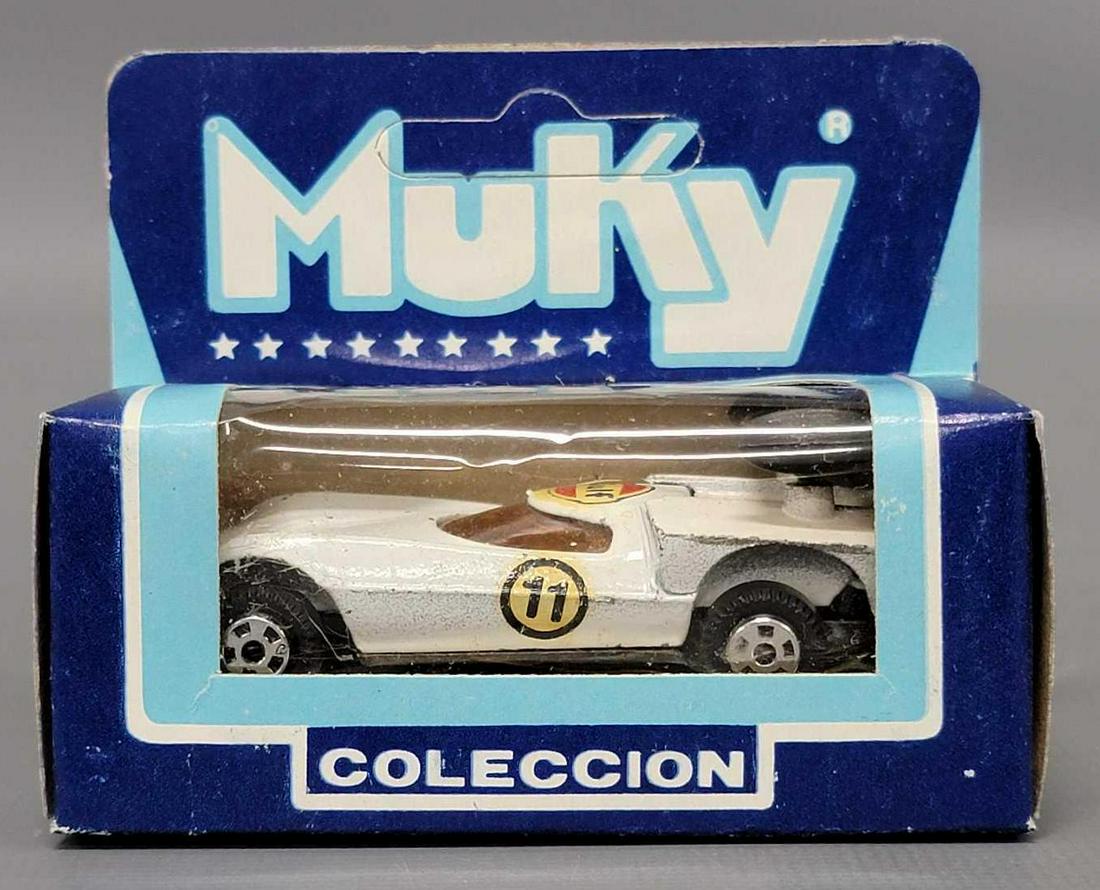 Muky 1/64 die cast white Lancia 3000 Gulf in original box Hot Wheels clone: Muky 1/64 die cast white Lancia 3000 Gulf in original box Hot Wheels clone, car has a number of small paint chips and also has a Gulf decal on the roof with an 11 roundel as seen in the photos.