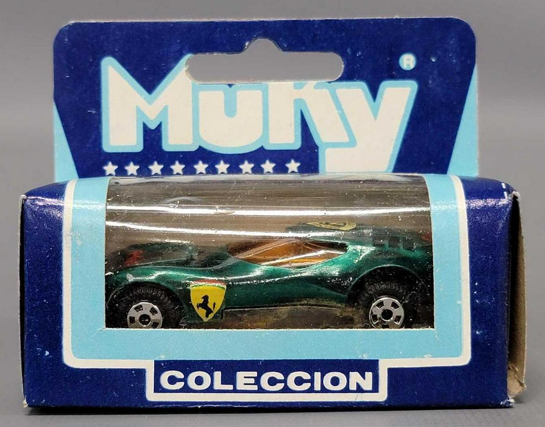 Muky 1/64 die cast green Lamborghini in original box Hot Wheels clone: Muky 1/64 die cast green Lamborghini in original box Hot Wheels clone, very nice car with a tiny amount of paint wear as seen in the photos.