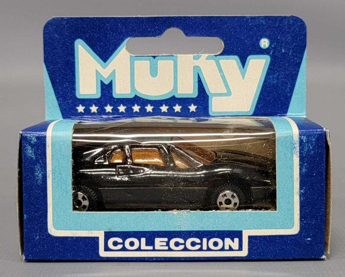 Muky 1/64 die cast black Ferrari 308 in original box Hot Wheels clone: Muky 1/64 die cast black Ferrari 308 in original box Hot Wheels clone, gorgeous car with no wear as seen in the photos.