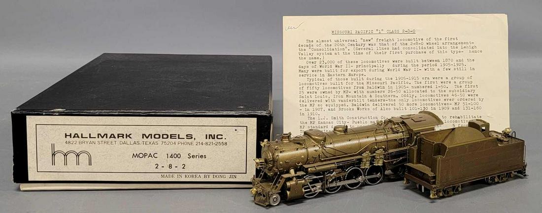 Hallmark HO scale brass MOPAC 1400 series 2-8-2 steam locomotive in original box: Hallmark HO scale brass MOPAC 1400 series 2-8-2 steam locomotive in original box, shows little to no run time and is C7-8 with a very good original box with original paperwork.