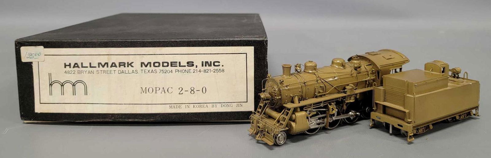 Hallmark HO scale brass MOPAC 2-8-0 steam locomotive in original box: Hallmark HO scale brass MKT 2-8-2 steam locomotive in original box, unit shows light run time, locomotive is C8, tender is C6 with tarnish spots, comes with a fair to good original box.