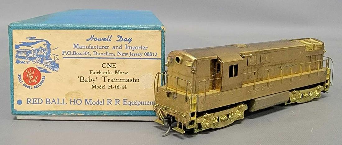 Red Ball Ho scale brass Fairbanks Morse H-16-44 Baby trainmaster diesel locomotive in OB: Red Ball Ho scale brass Fairbanks Morse H-16-44 Baby trainmaster diesel locomotive in original box, unit shows moderate run time and is C5 in a very good original box.
