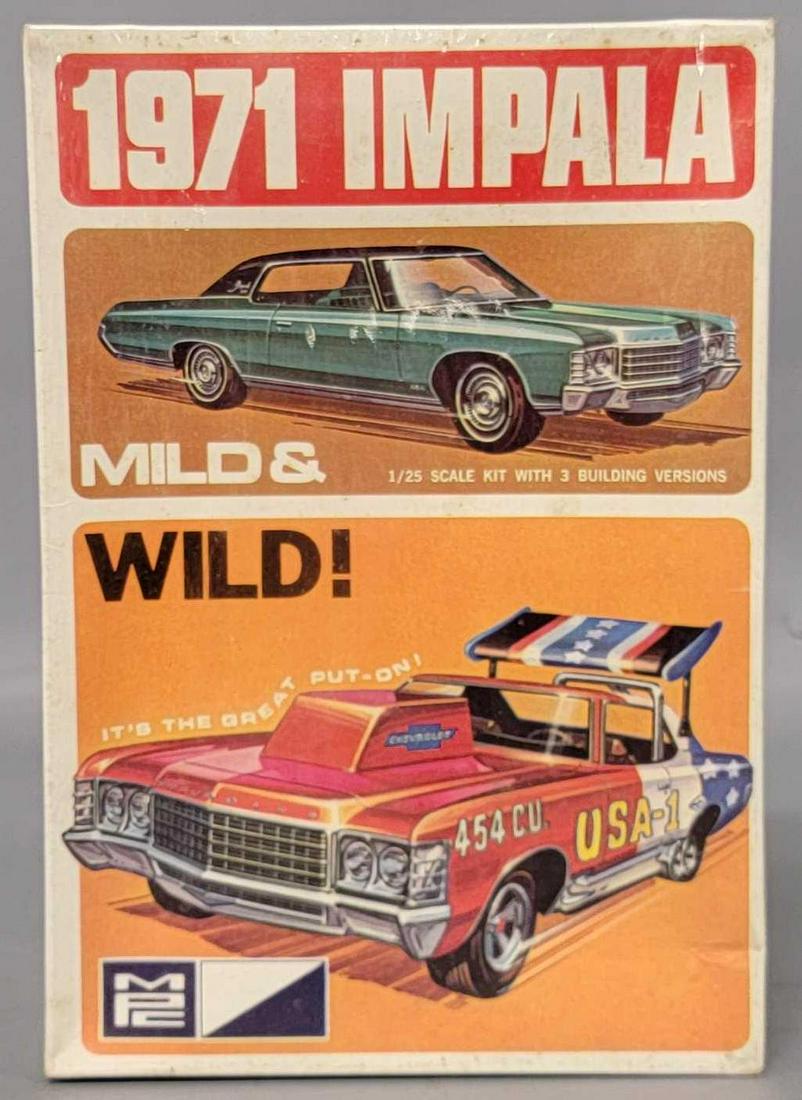 MPC 1/25 scale 17103-225 1971 Impala model kit factory sealed: MPC 1/25 scale 17103-225 1971 Impala model kit factory sealed, kit is excellent, box is excellent with moderate cupping to the top and side panels, shrink wrap is split at seam on one side.