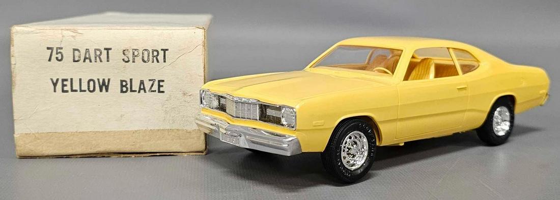 1975 Dodge Dart Sport yellow blaze dealer promo car in original box: 1975 Dodge Dart Sport yellow blaze dealer promo car in original box. Car is near mint to mint in a very good original box as seen in the photos.
