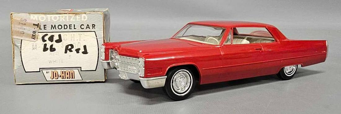 1966 Cadillac Coupe de Ville hardtop red friction promo car in original box (1 of 9)
