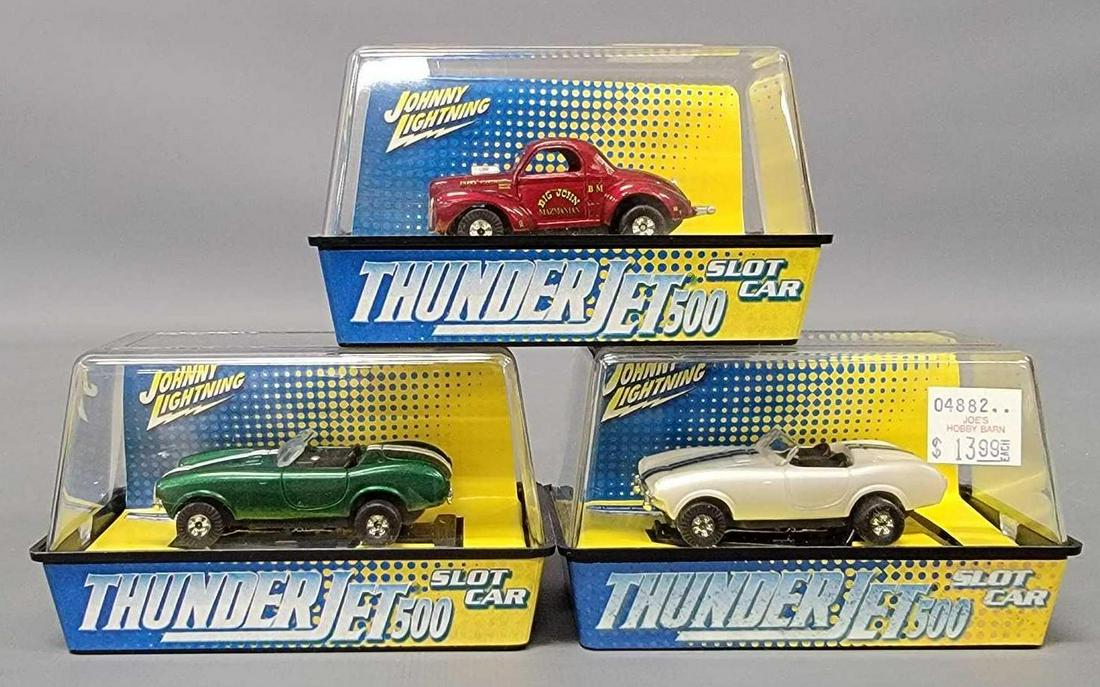 Three different Thunderjet 500 HO scale slot cars in factory sealed original boxes. (1 of 6)
