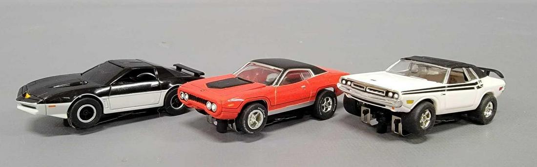 Three loose Auto World HO scale slot cars (1 of 7)