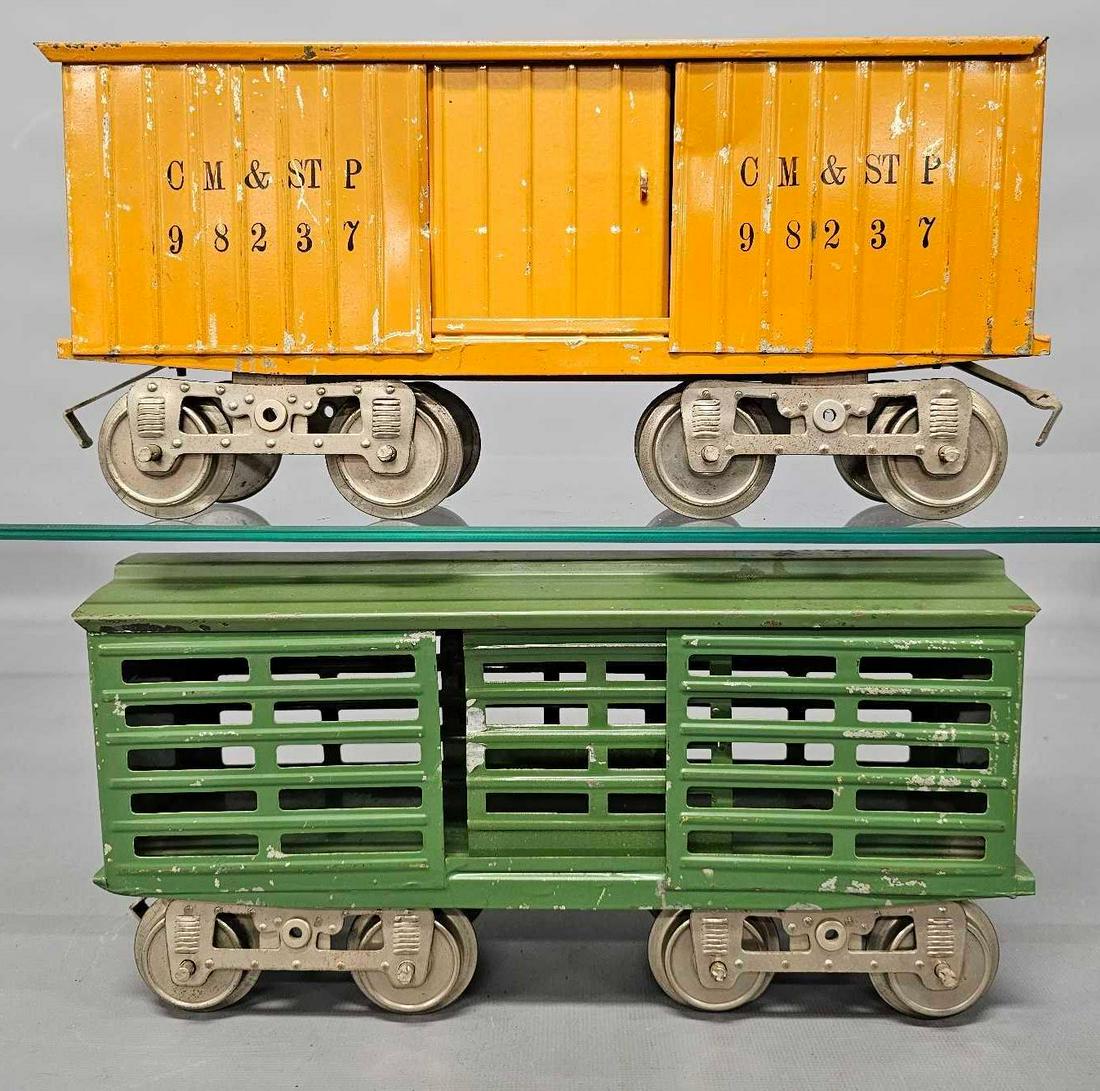 Lionel prewar standard gauge 13 stock car and 14 box car one embossed: Lionel prewar standard gauge 13 stock car with embossed lettering underneath and a14 box car, C6 as seen in the photos.