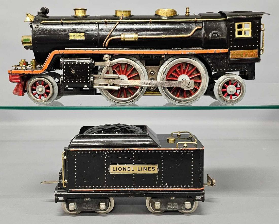 Lionel prewar standard gauge 390E steam locomotive and tender: Lionel prewar standard gauge 390E steam locomotive and 390T tender, locomotive has been re-wheeled and has a ding on the cab roof overhang, both are C6 as seen in the photos.