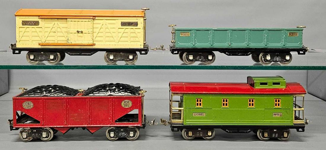 Four Lionel prewar standard gauge 500 series freight cars: Four Lionel prewar standard gauge 500 series freight cars to include 514 reefer, 512 gondola, 516 hopper with load data and 517 caboose, C6 as seen in the photos.