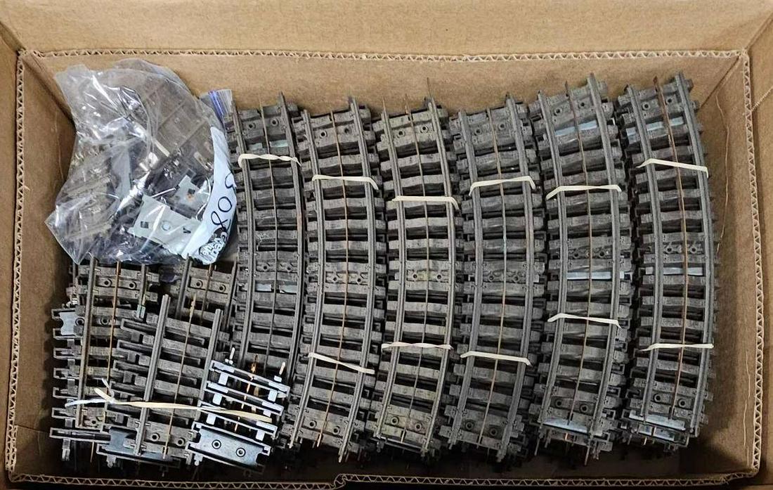 Large group of Lionel postwar Super O track power connectors uncouplers and more: Large group of Lionel postwar Super O curved and straight track, power connectors, uncouplers and bus connectors, track has dust and should clean up, bus connectors are clean as seen in the photos.