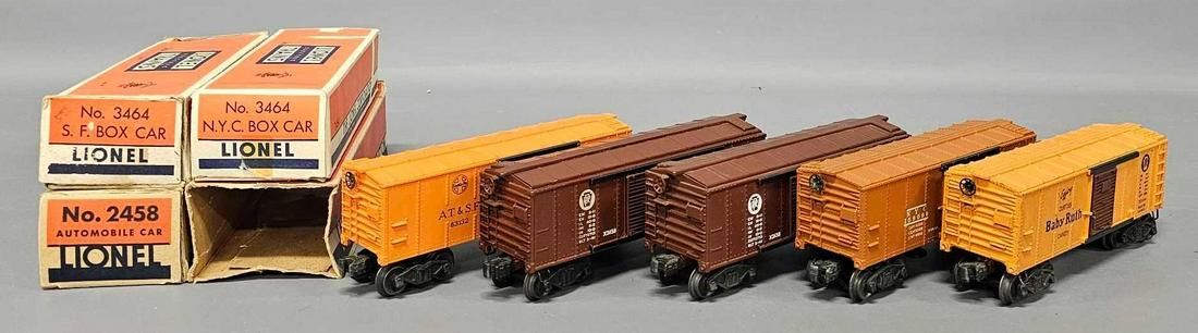 Five Lionel postwar O box cars with four original boxes: Five Lionel postwar O box cars with four original boxes to include 2454 Baby Ruth, New York Central and Santa Fe 3464 operating box cars and two 2458 Pennsylvania automobile box cars, C6-7 with poor t