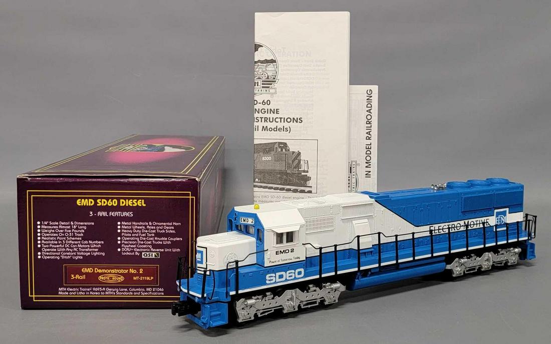 MTH Premier O gauge EMD SD-60 demonstrator diesel locomotive in original box MT-2119LP: MTH Premier O gauge EMD SD-60 demonstrator diesel locomotive in original box, stock number MT-2119LP, unrun and C9-10 in an excellent original box with original paperwork as seen in the photos.
