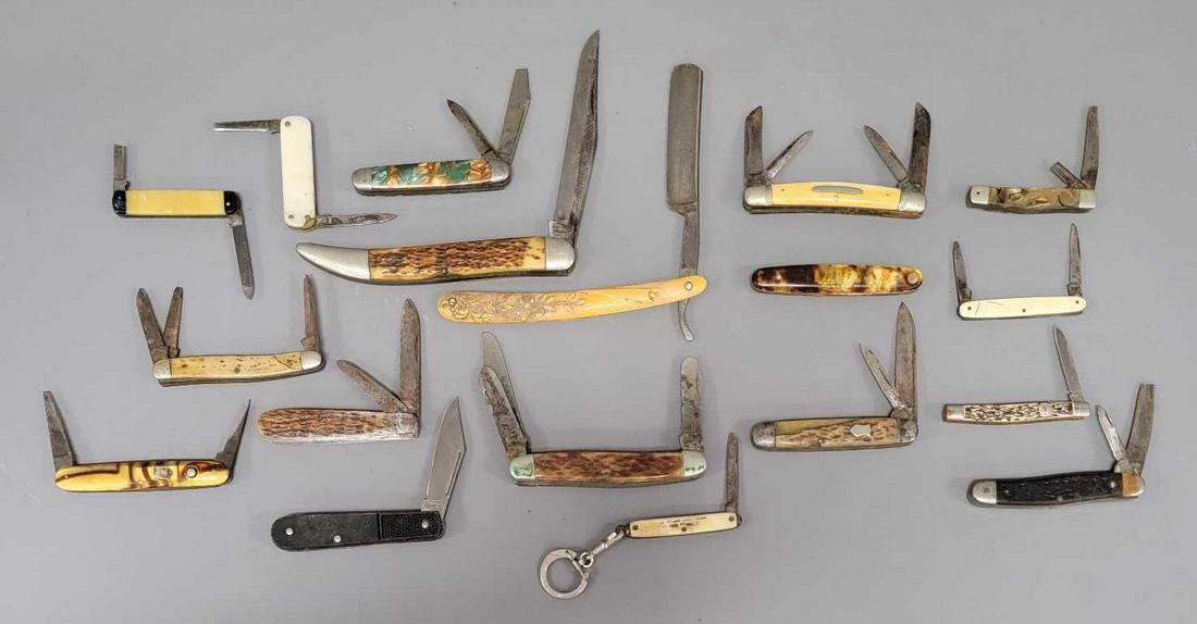 Group of eighteen old pocket knives: Group of eighteen old pocket knives and a straight razor. All are damaged by either rust or have minor to major damage as seen in the photos.