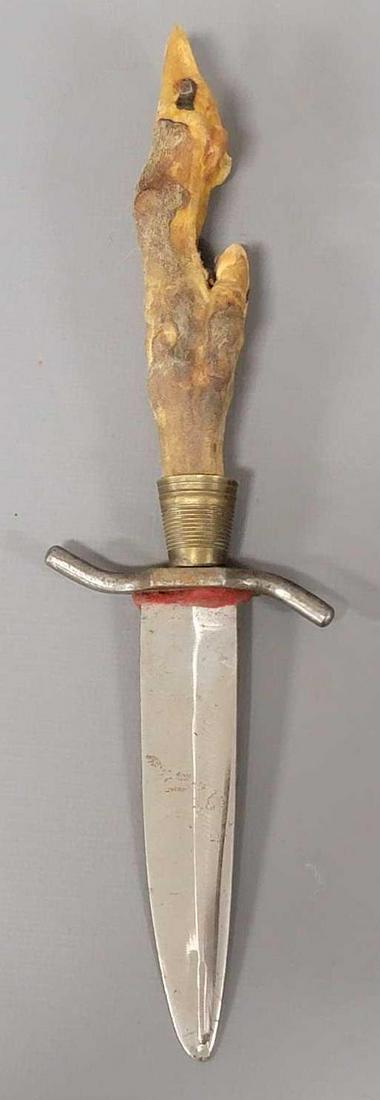 A W Wadsworth & Son Bowie knife made in Germany with animal foot handle: A W Wadsworth and Son Bowie knife made in Germany with animal foot handle, a very sharp blade that is 3 3/4 inches long, 8 1/2 inches overall as seen in the photos.