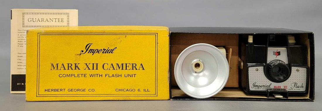 Mint unused vintage Imperial Mark XII camera with flash unit in original box 725: Mint unused vintage Imperial Mark XII camera with flash unit in original box, model No 725, brown camera and ivory flash unit, made of bakelite, brand new, never used in original box with all original