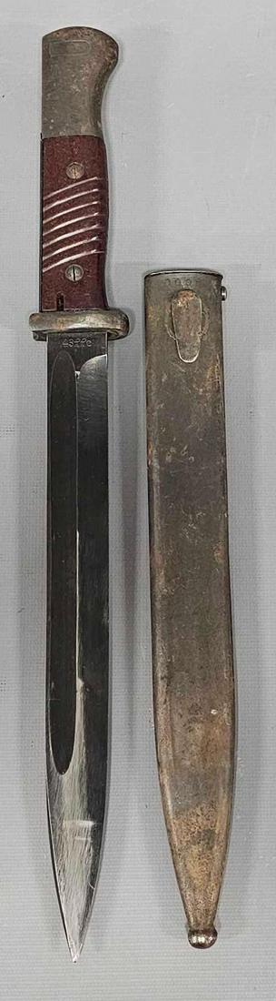 World War II German bayonet with scabbard: World War II German bayonet with scabbard, as seen in the photos.