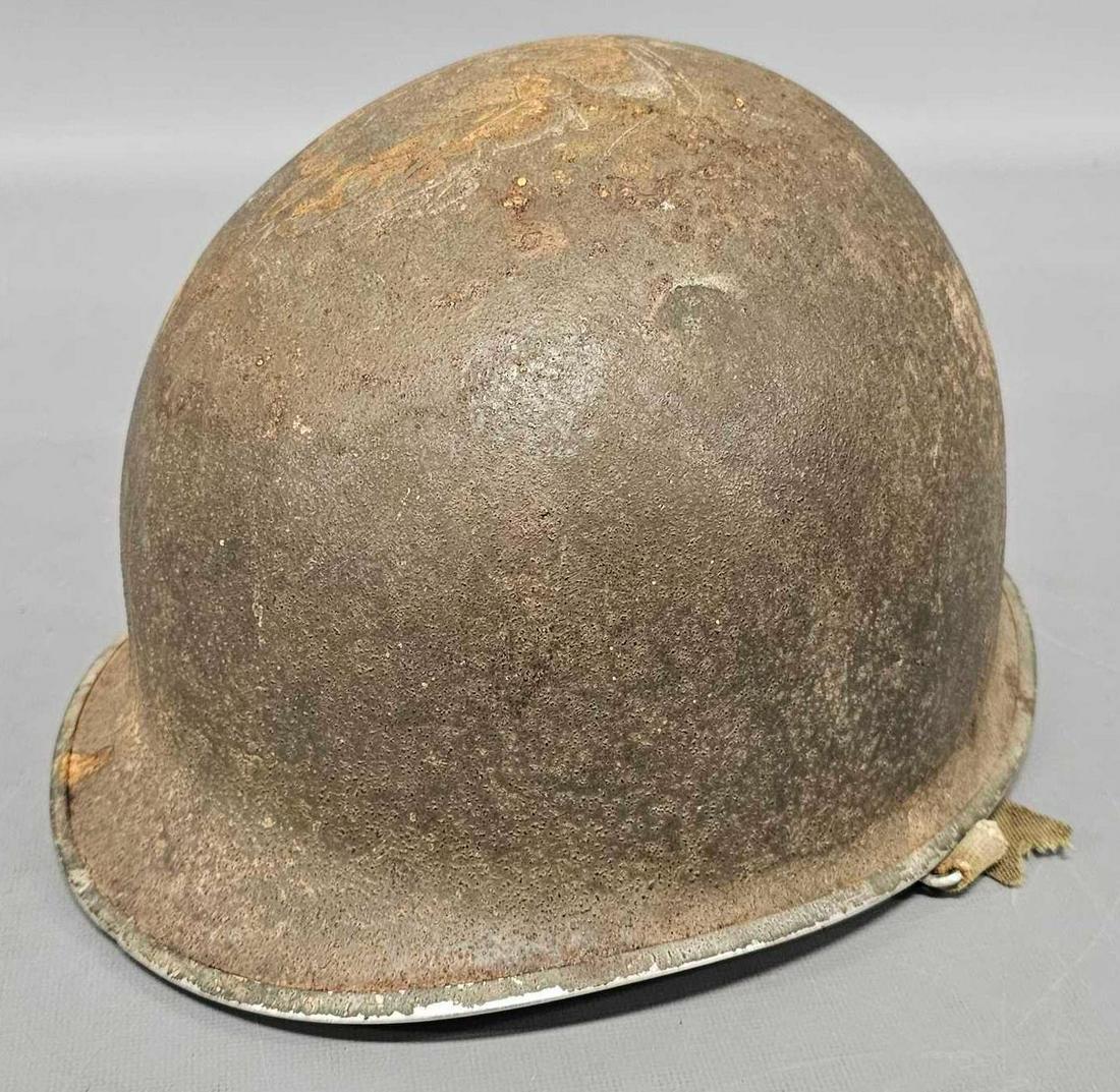 US WWII M1 front seam helmet with rough liner: US WWII M1 front seam helmet with rough liner. Sold as-is as seen in the photos with no returns.