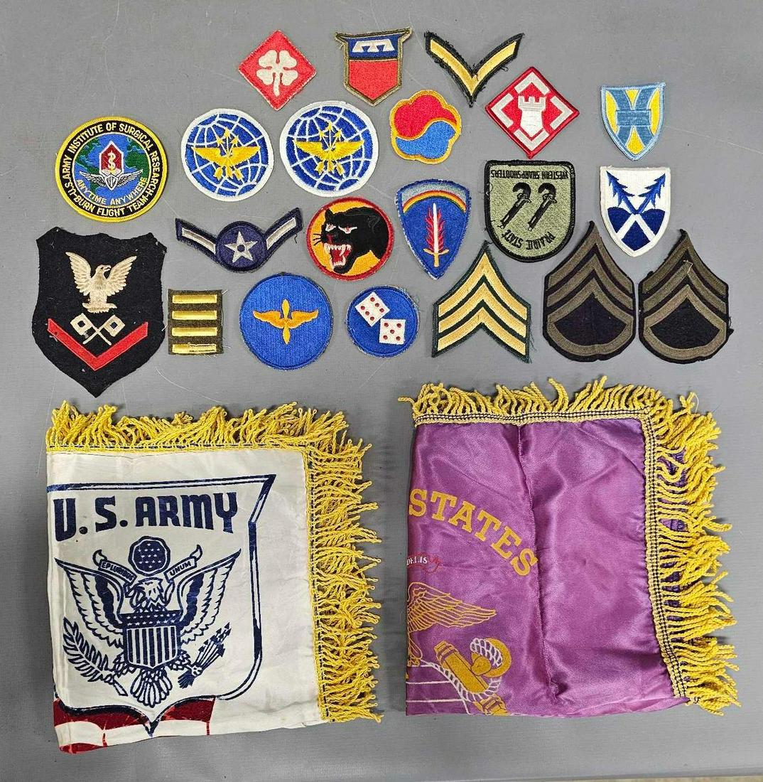 Two pillow shams and a group of patches: Two pillow shams to include United States marines and Louisiana Maneuvers plus a group of patches, mixed WWI and WWII items in nice shape as seen in the photos.