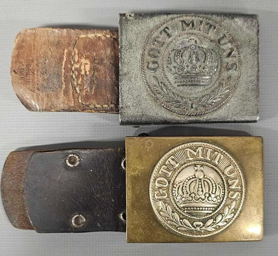 Two WWI German belt buckles with leather tongues: Two WWI German belt buckles with leather tongues, very good to excellent condition as seen in the photos.