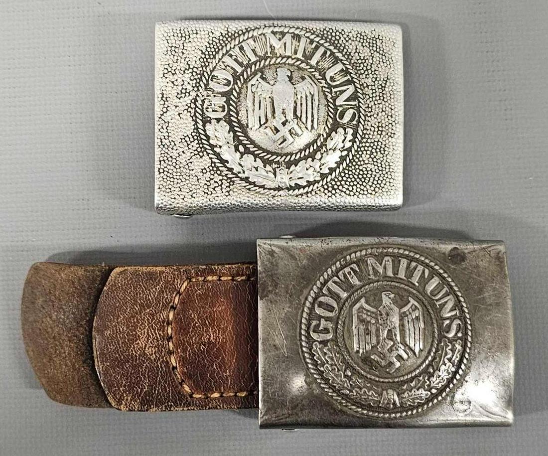 Two WWII German belt buckles: Two WWII German belt buckles, one steel with tongu and one aluminum with no tongue, very good plus condition as seen in the photos.