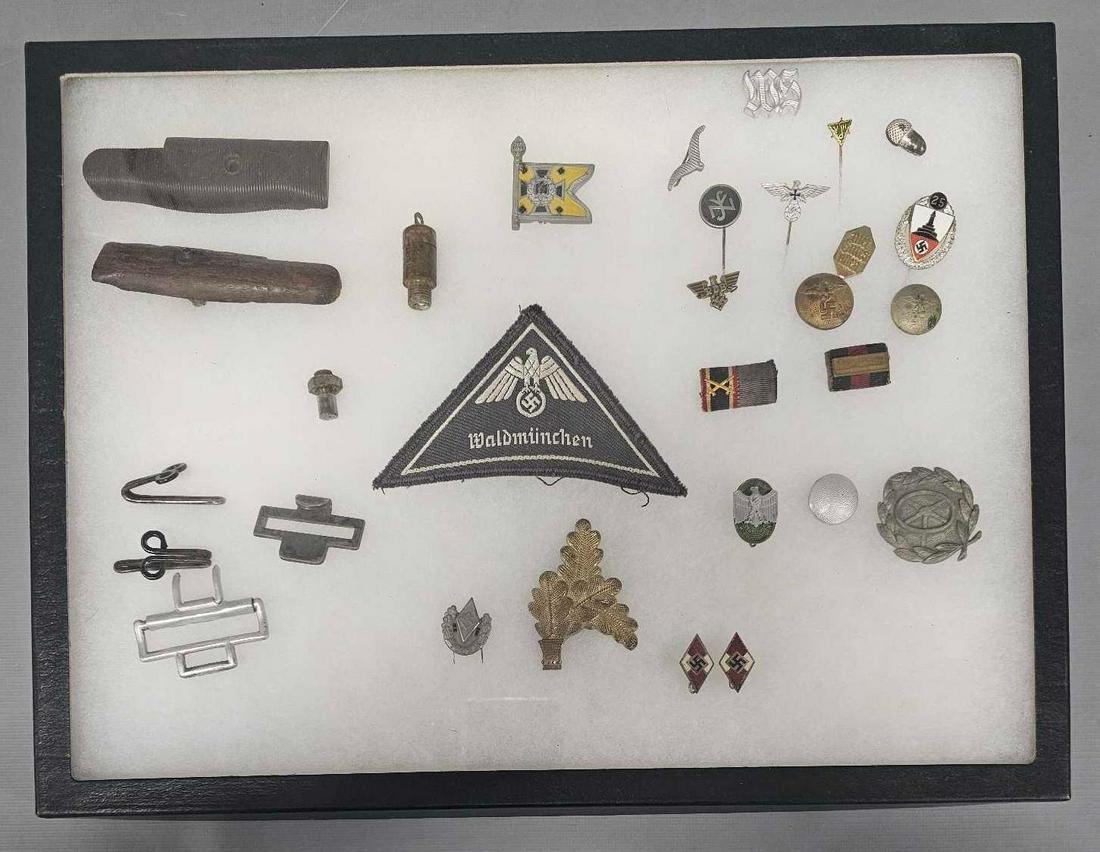 Large group of WWII Nazi stick pins buttons and tinnies: Large group of WWII Nazi stick pins, buttons and tinnies plus two ribbon bars plus a social worker sleeve eagle. Sold as-is as seen in the photos with no returns.