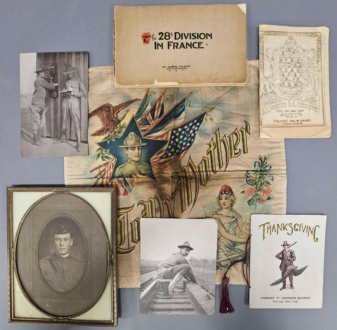 Grouping of WWI US Military memorabilia etc: Grouping of WWI US Military memorabilia to include postcards, photographs, a pillow sham that has some browning, The 28th Division in France book, a brass picture frame with photo and then a 1940 Than