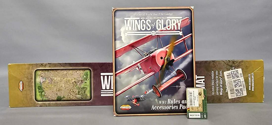 Wings of Glory Game Mat, Rules and Accessories pack plus promo deck: Wings of Glory BO1IU5VS84 Game Mat, WGF002A Rules and Accessories plus a factory sealed WGF701A WWI ace and skill cards promo deck as seen in the photos. The mat and rules have been opened and used fo