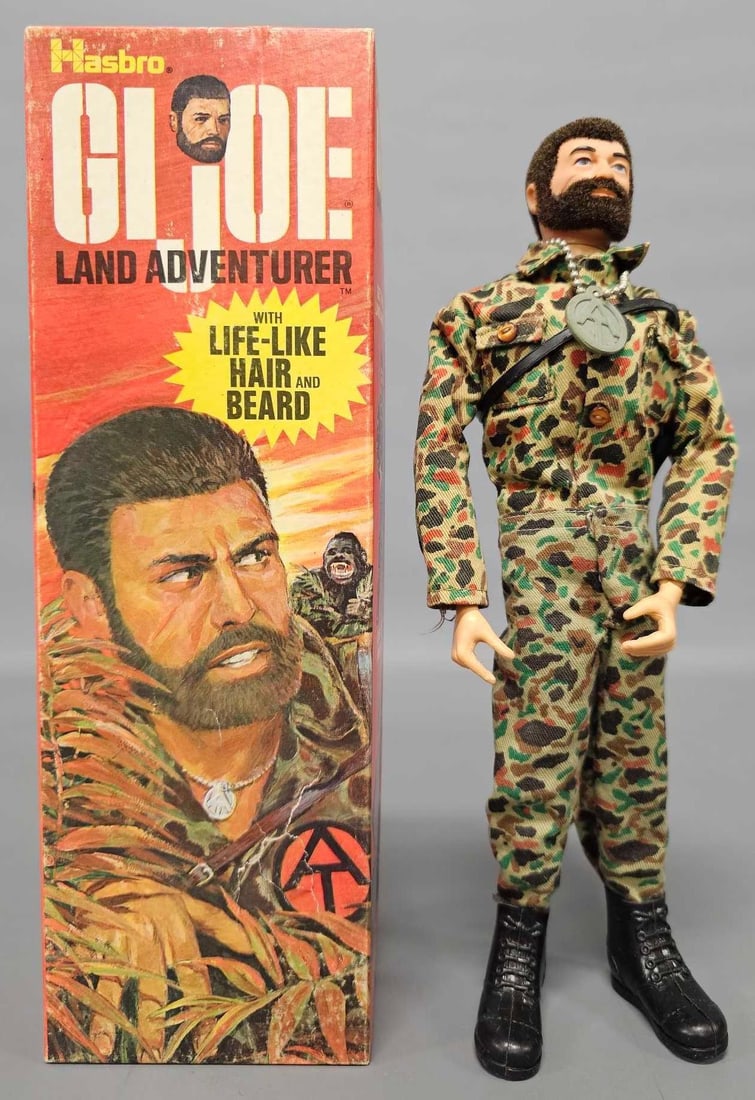 Vintage Hasbro GI Joe Land Adventurer in original box 7401: Vintage Hasbro GI Joe Land Adventurer in original box, stock number 7401. A nice figure with flocked hair and posable joints with a R Hong Kong uniform, boots Adventure Team tag and a shoulder holster