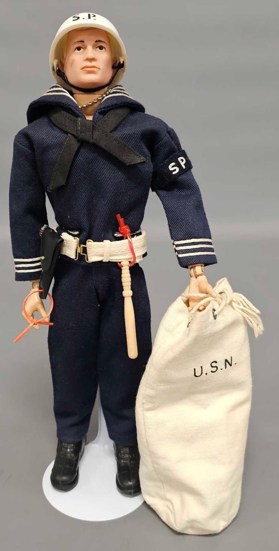 Vintage Hasbro GI Joe Shore Patrol: Vintage Hasbro GI Joe Shore Patrol with a Patent Pending body with yellow painted hair, wear to head and eyebrow paint, dirty from play wear, typical knee cracks and posable joints. The uniform is nic