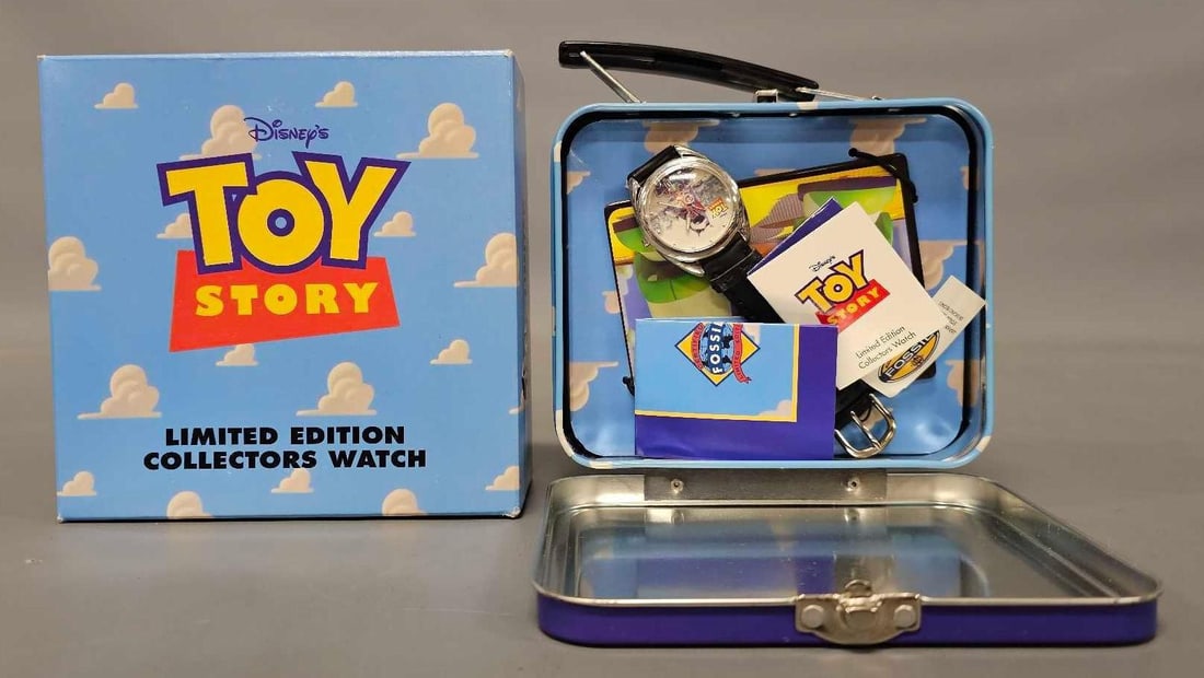 Mint Fossil Toy Story wrist watch in original box: Mint Fossil Toy Story wrist watch in original box. Shows Woody, Buzz and RC as seen in the photos. Comes with all original paperwork and tags as seen in the photos.