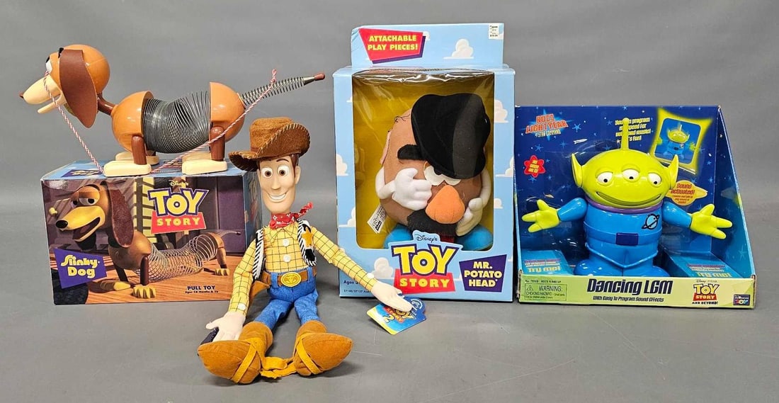 Four Toy Story toys with original boxes or tags (1 of 6)
