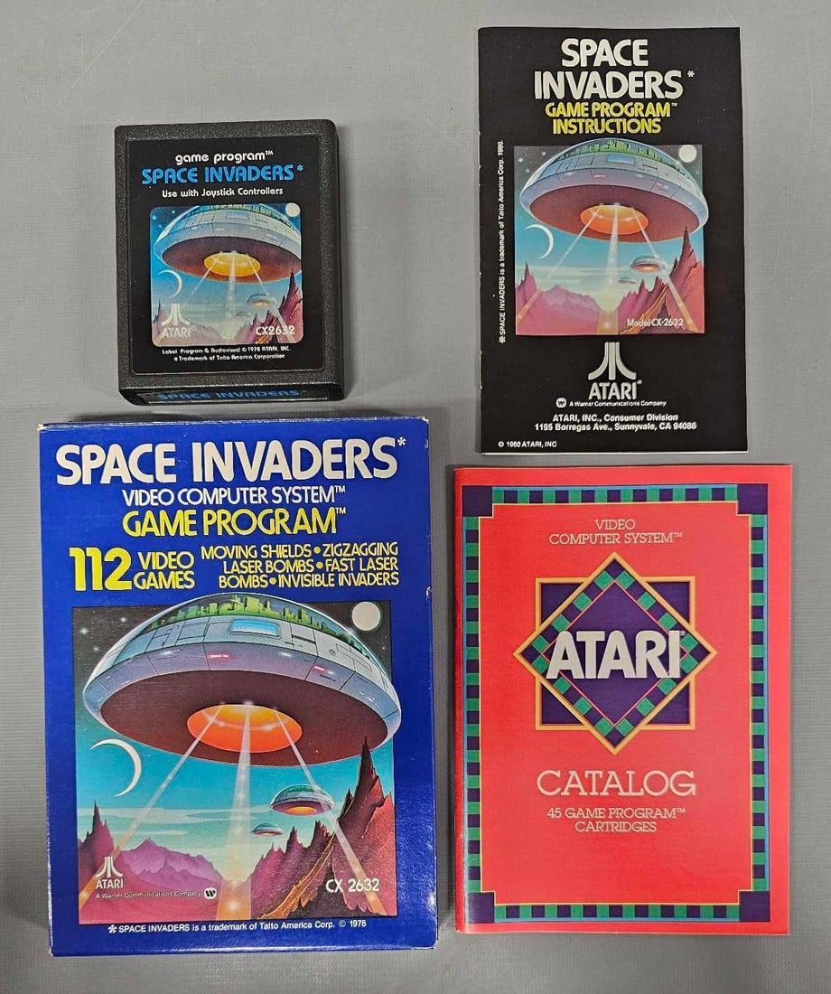 Atari 2600 Space Invaders game cartridge with original box and instruction sheet (1 of 7)